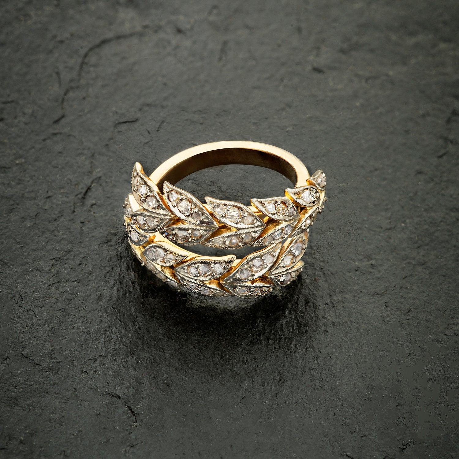 Bespoke remodelled cocktail ring repurposing client's chandelier earrings with old-cut diamonds