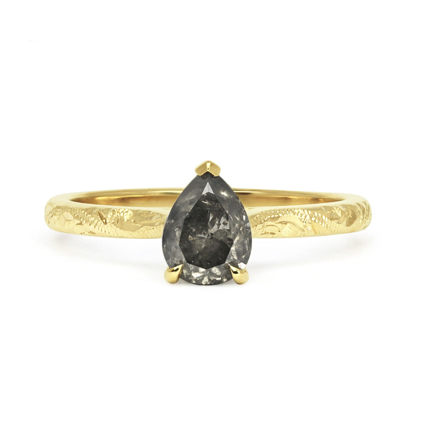 18ct recycled yellow gold solitaire engagement ring with an ethical pear-cut salt and pepper diamond and hand-engraved band