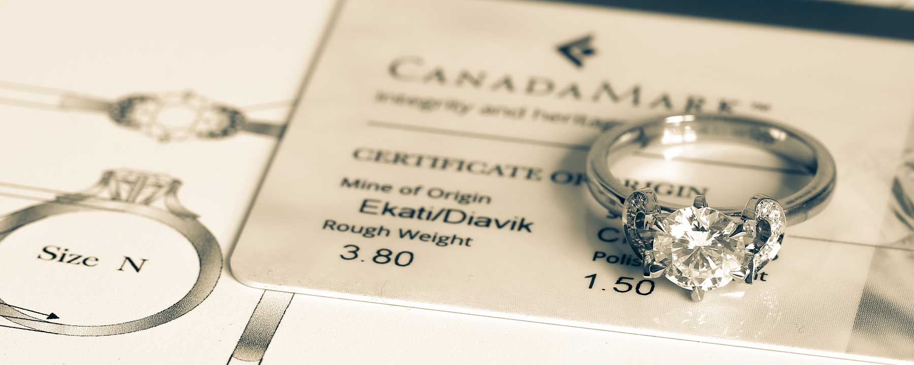 A bespoke diamond engagement ring with its unique Canadamark certification
