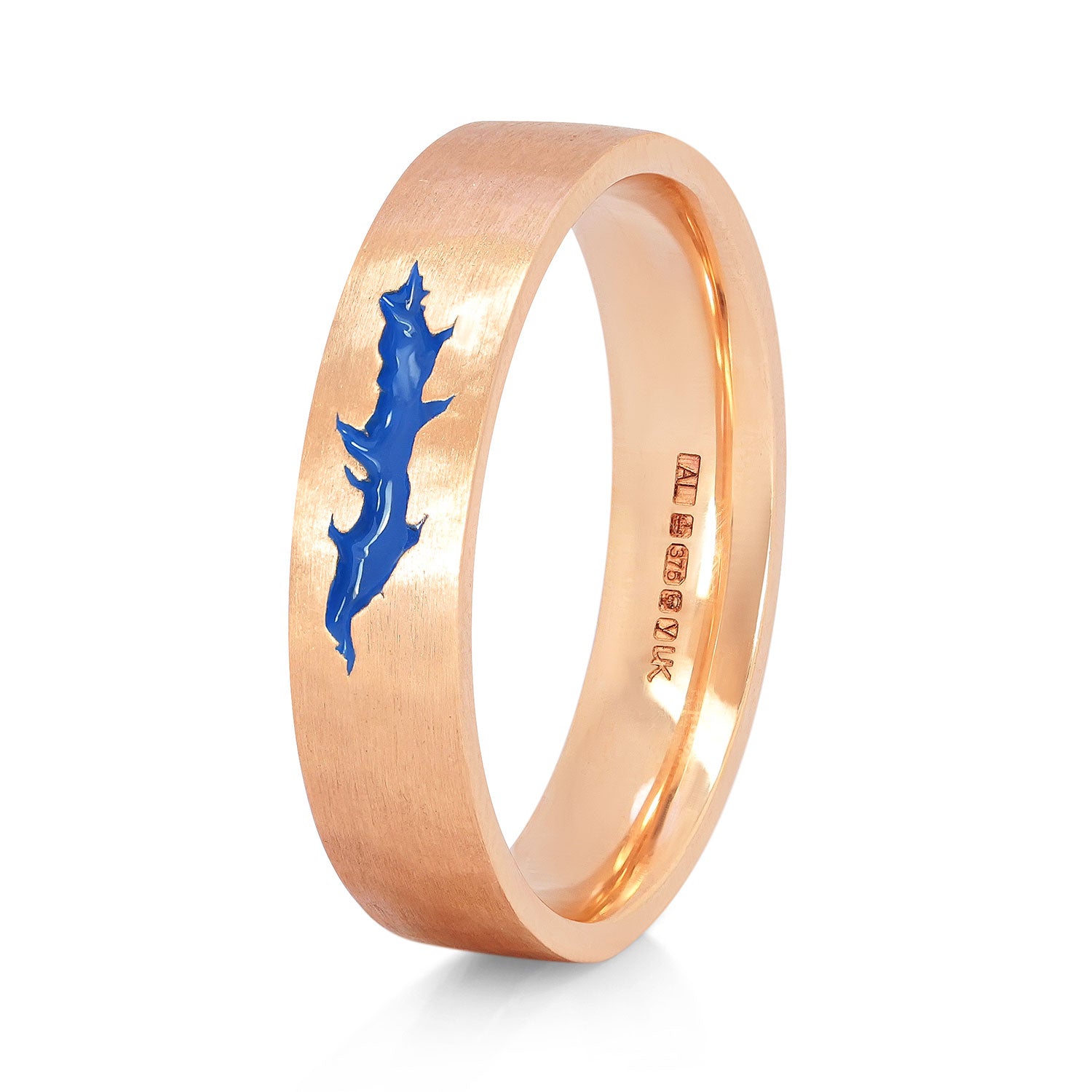 Bespoke flat court wedding band, finished with soft hammered and matte texture and a fissure inlayed with blue enamel. 9ct recycled rose gold reworked from an old heirloom piece