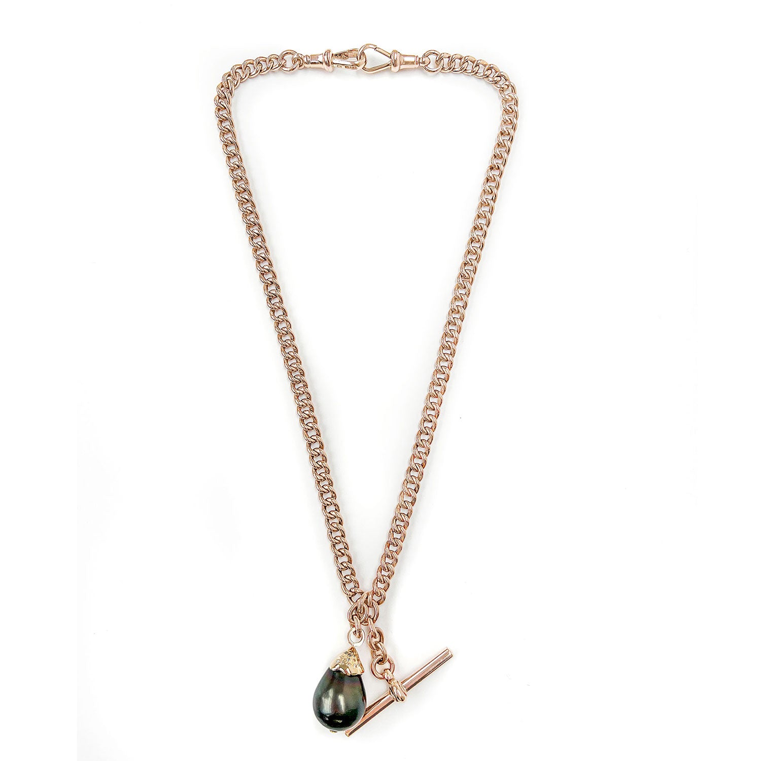Unique pendant, crafted from recycled rose gold chain, an upcycled repurposed antique Victorian T-bar clasp and an eco-friendly black Tahitian pearl in a 'drop' setting embellished with reclaimed broken diamonds, secondary view