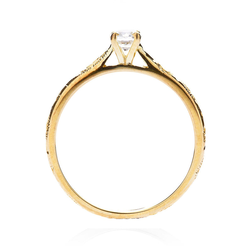 Lebrusan Studio ready to wear Athena solitaire engagement ring with 18ct recycled gold, a reclaimed brilliant-cut diamond and hand-engraved scrolls