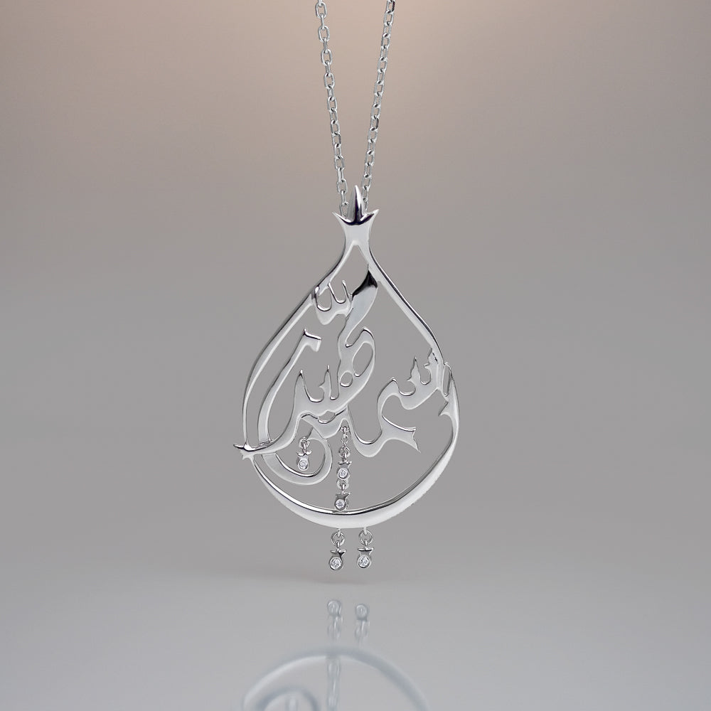 Bespoke white gold pendant with romantic Arabic pendant
