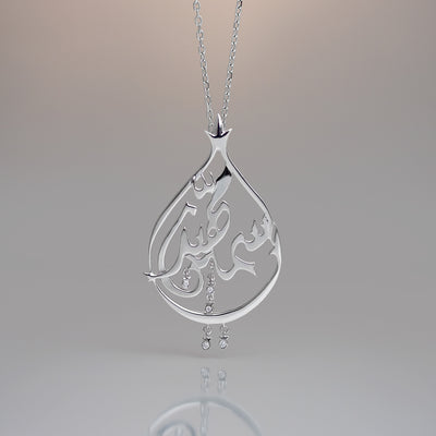 Bespoke white gold pendant with romantic Arabic pendant