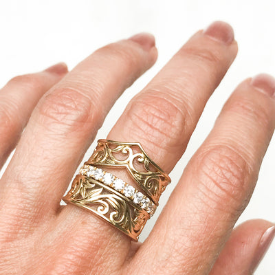 Artisan Filigree Ethical Gold Commitment Ring on hand, stacked with Altair micro-set conflict-free diamond commitment ring and Filigree Artisan Wishbone ring