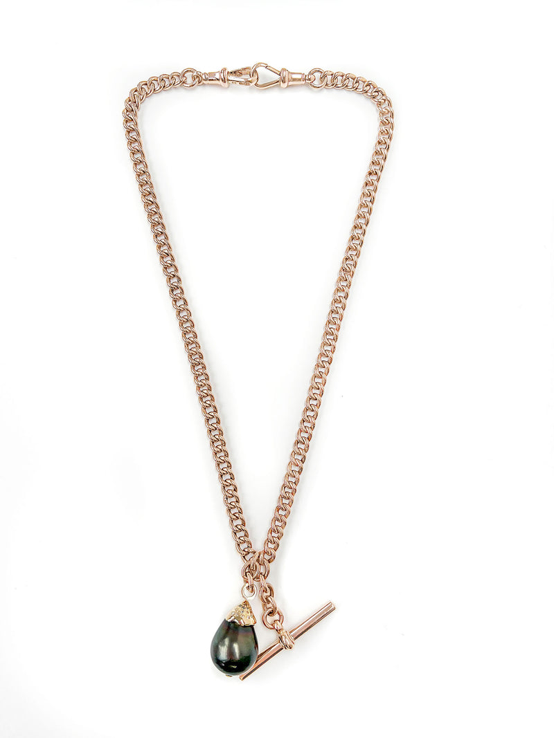 Unique pendant, crafted from recycled rose gold chain, an upcycled repurposed antique Victorian T-bar clasp and an eco-friendly black Tahitian pearl in a 'drop' setting embellished with reclaimed broken diamonds