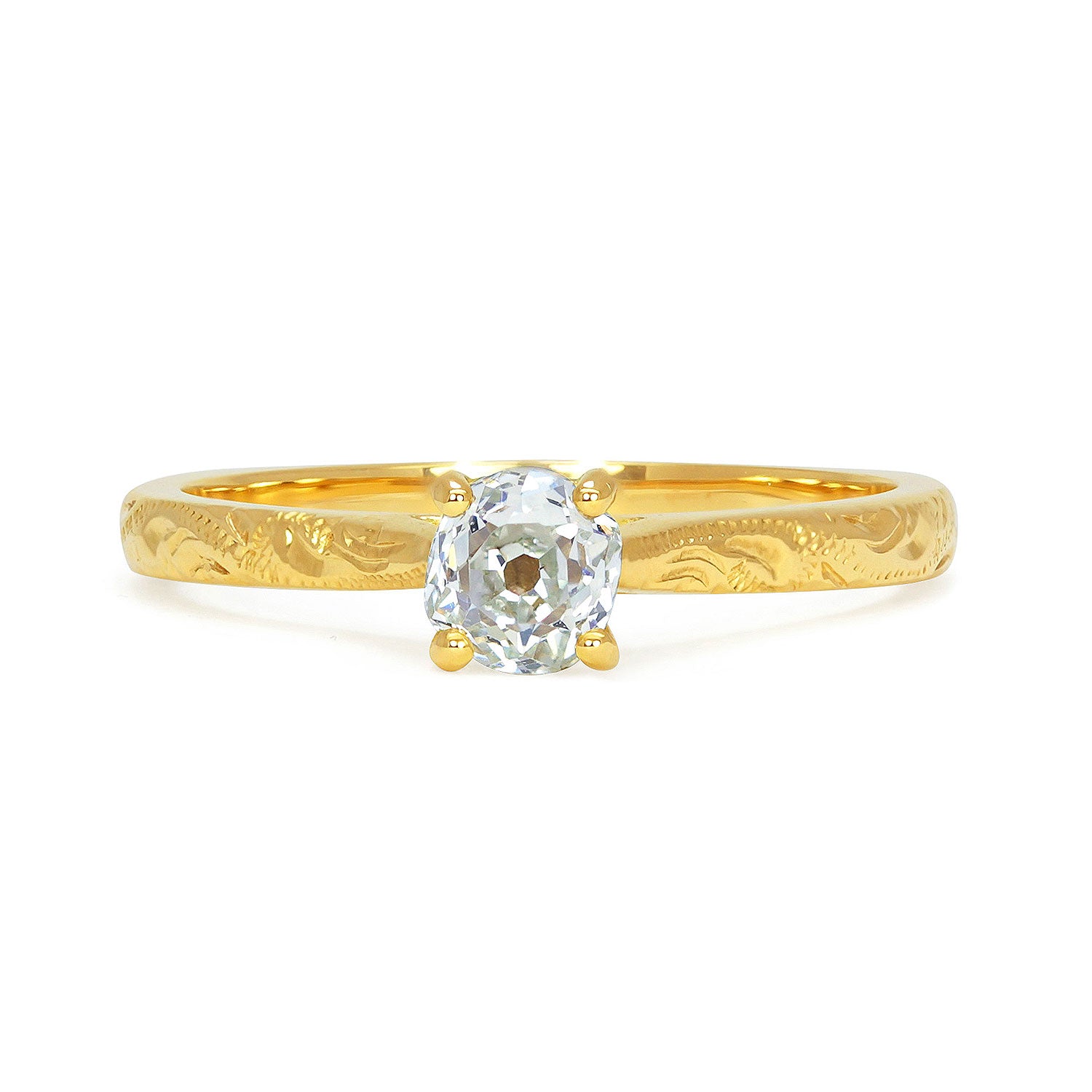 Fancy Athena engagement ring in 18ct yellow recycled gold, set with a 0.4ct sustainable recycled old cushion cut diamond and hand engraved with Art Nouveau scrolls