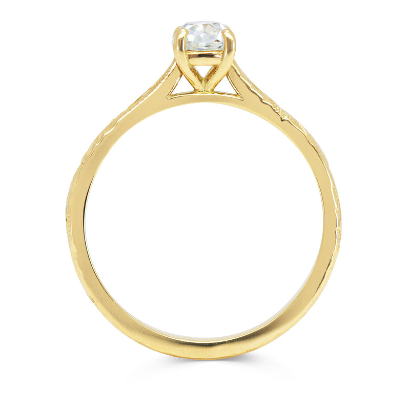 Fancy Athena engagement ring in 18ct yellow recycled gold, set with a 0.4ct sustainable recycled old cushion cut diamond and hand engraved with Art Nouveau scrolls