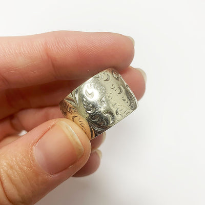 A trio of hand-engraved friendship rings, cast in 9ct recycled white gold, remodelled from our clients' late mother's ring 5