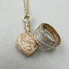 Reclaimed Vintage hand-engraved antique Victorian locket pendant with triple eternity ring of two antique half diamond eternity rings