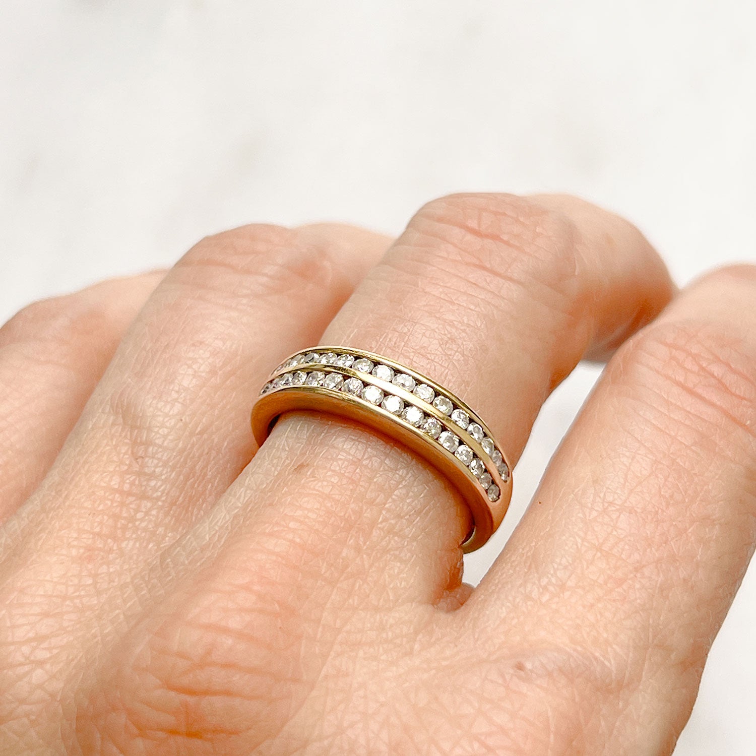 Reclaimed Vintage commitment ring with two antique Victorian half diamond eternity rings, on hand 2
