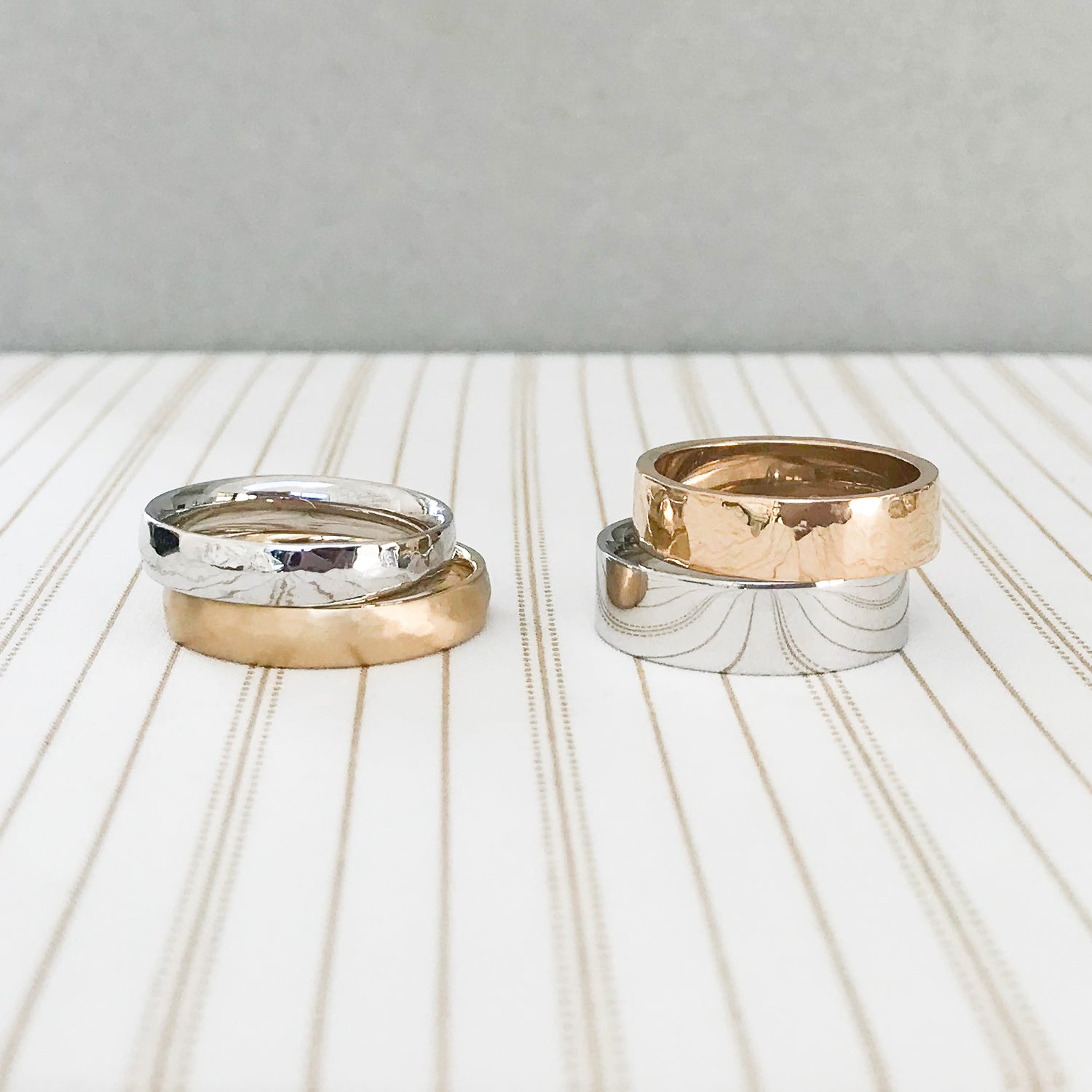 Classic men's wedding bands of various shapes and widths