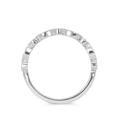 Lebrusan Studio's Amare Marquise wedding band in recycled platinum. Conflict-free Canadian diamonds are set into round and marquise-shaped settings with hand-engraved milgrain beading around the edges. Side view