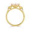 Lebrusan Studio Fancy Athena trilogy engagement ring with hand-engraved 18ct Fairmined Eco Gold, a cushion-cut pink sapphire and two trillion-cut pink sapphires, side view
