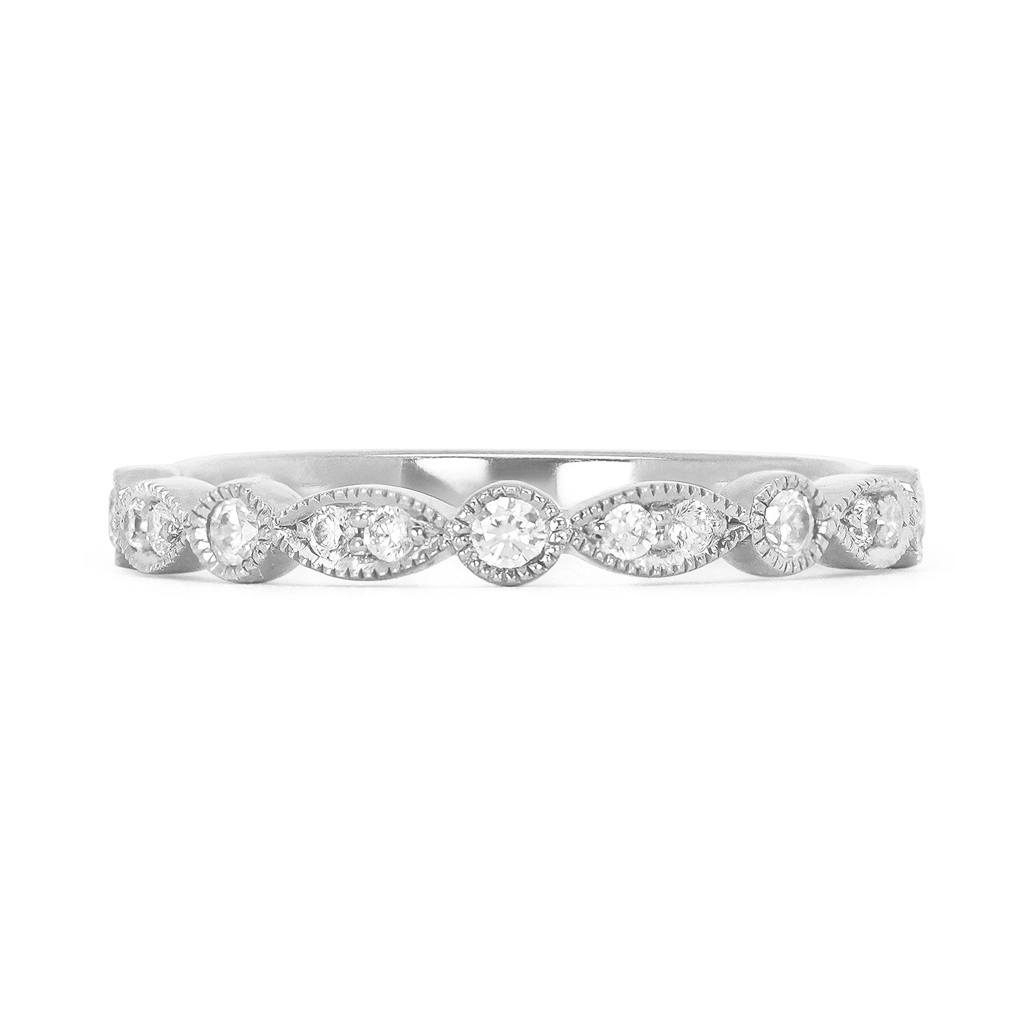 Lebrusan Studio's Amare Marquise wedding band in recycled platinum. Conflict-free Canadian diamonds are set into round and marquise-shaped settings with hand-engraved milgrain beading around the edges