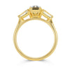 Lebrusan Studio Fancy Athena trilogy engagement ring with hand-engraved 18ct yellow Fairmined Eco Gold band and three emerald cut grey sapphires of ethical traceable origin, side view