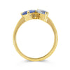 Lebrusan Studio Fancy Athena toi et moi engagement ring with hand-engraved 18ct yellow Fairmined Eco Gold band, a pear-cut blue sapphire and a marquise blue sapphire of ethical traceable origin, side view