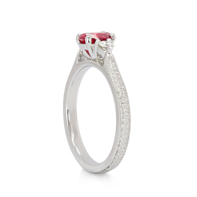 Bespoke Hannah ethical engagement ring, cast in recycled platinum and set with a 0.55ct oval cut Malawi ruby and traceable Canadian diamonds, side 2