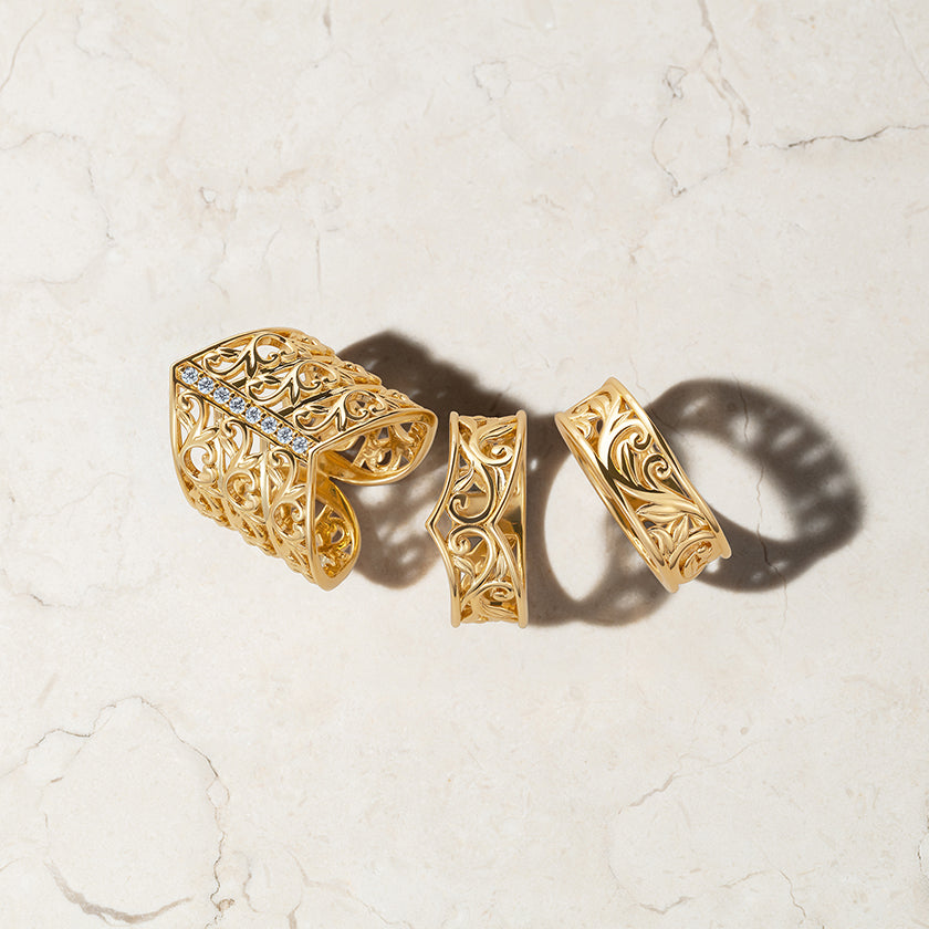Lebrusan Studio's Artisan Filigree collection of hand-crafted filigree shaped wedding bands and jacket rings in Fairmined Ecological Gold and artisanal Ocean Diamonds