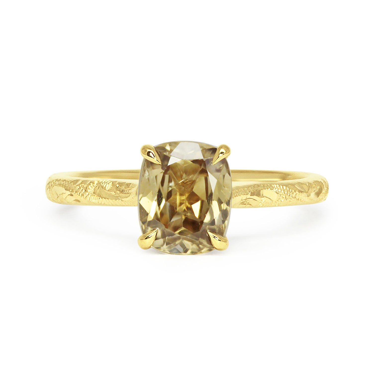 Lebrusan Studio solitaire engagement ring with hand-engraved 18ct recycled gold band and a cushion-cut gold zircon of traceable fair trade provenance