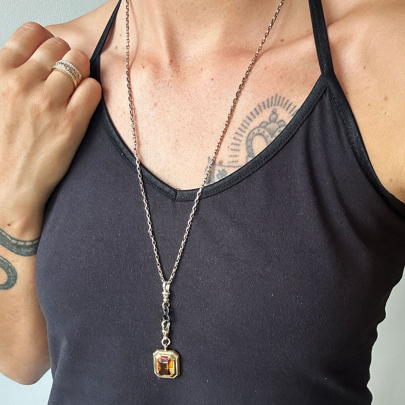 Reclaimed Vintage necklace with Brazilian quartz, recycled antique Victorian gold chain and connectors, and a black diamond figure-of-eight connector
