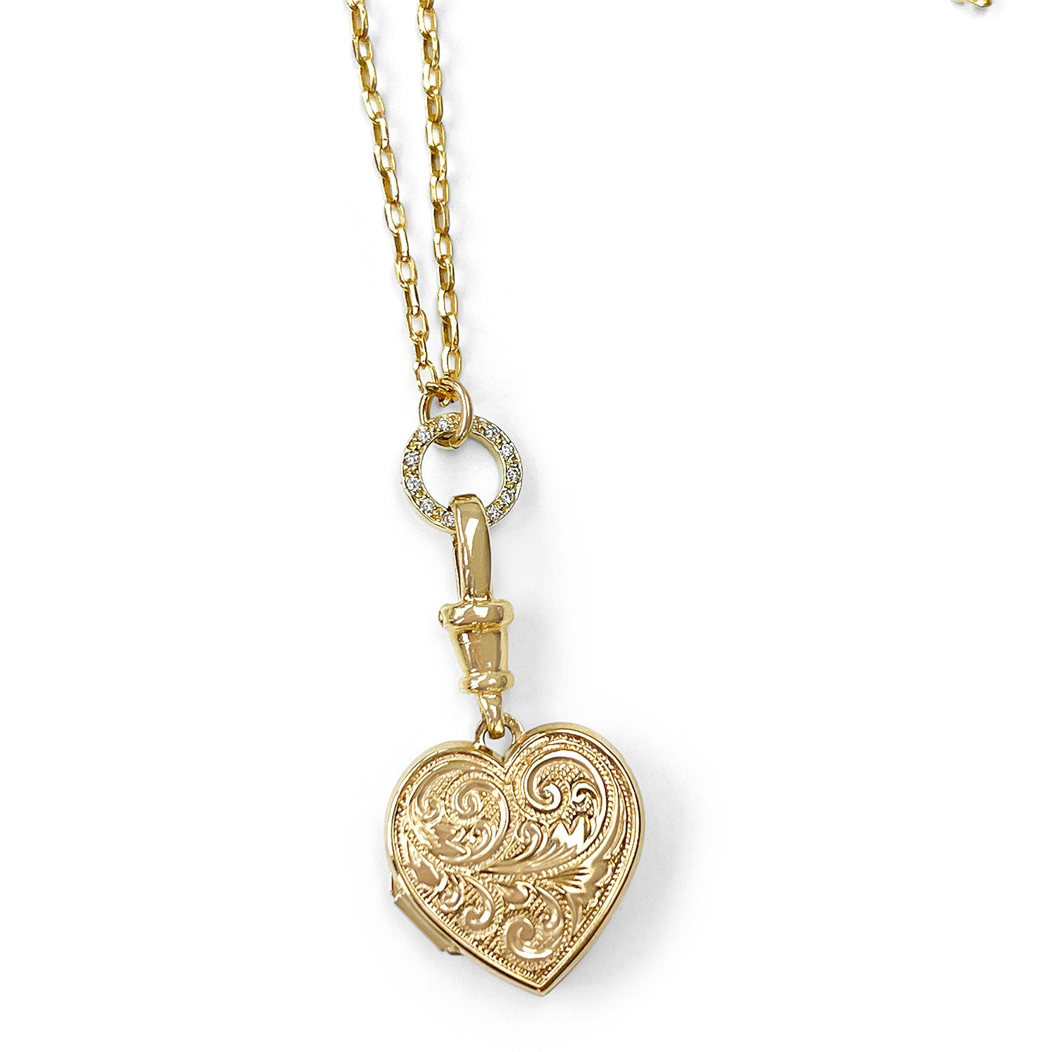 Reclaimed antique Victorian hand-engraved gold heart-shaped locket pendant necklace on a reclaimed antique gold chain, with a circlet connector in sustainable recycled gold and conflict-free Canadian diamonds