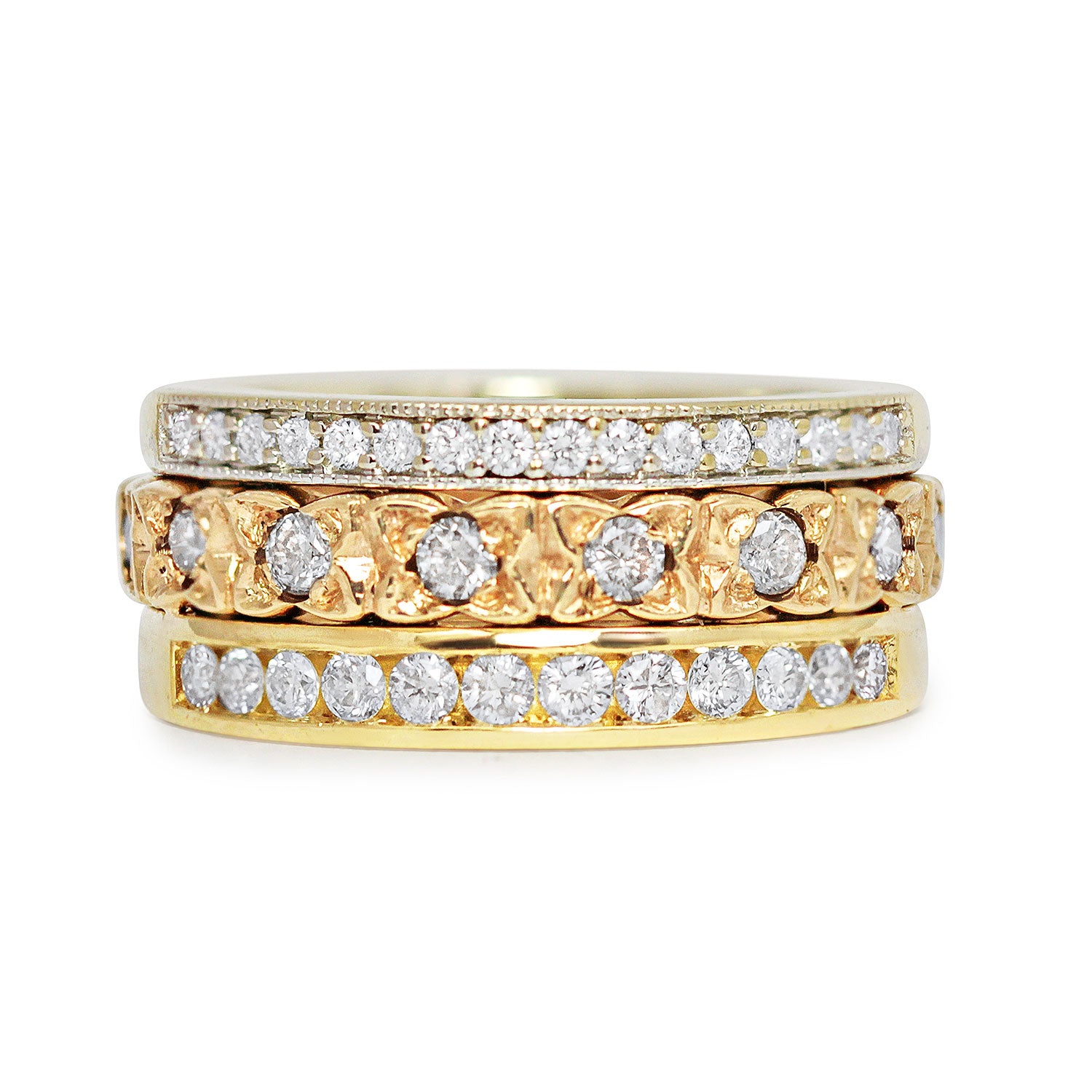 Three antique 9ct gold Victorian eternity rings half-set with diamonds, soldered together into a chunky stack
