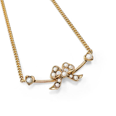 Reclaimed Vintage antique Victorian ribbon pearl brooch on a slim reclaimed 9ct gold necklace