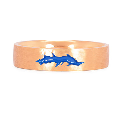 Bespoke flat court wedding band, finished with soft hammered and matte texture and a fissure inlayed with blue enamel. 9ct recycled rose gold reworked from an old heirloom piece. Top view