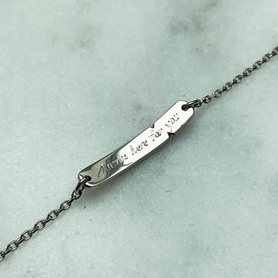 Bespoke Mabelle recycled white gold hammered finish baby bracelet with adjustable chain and hand-engraved message, inside view of inscription