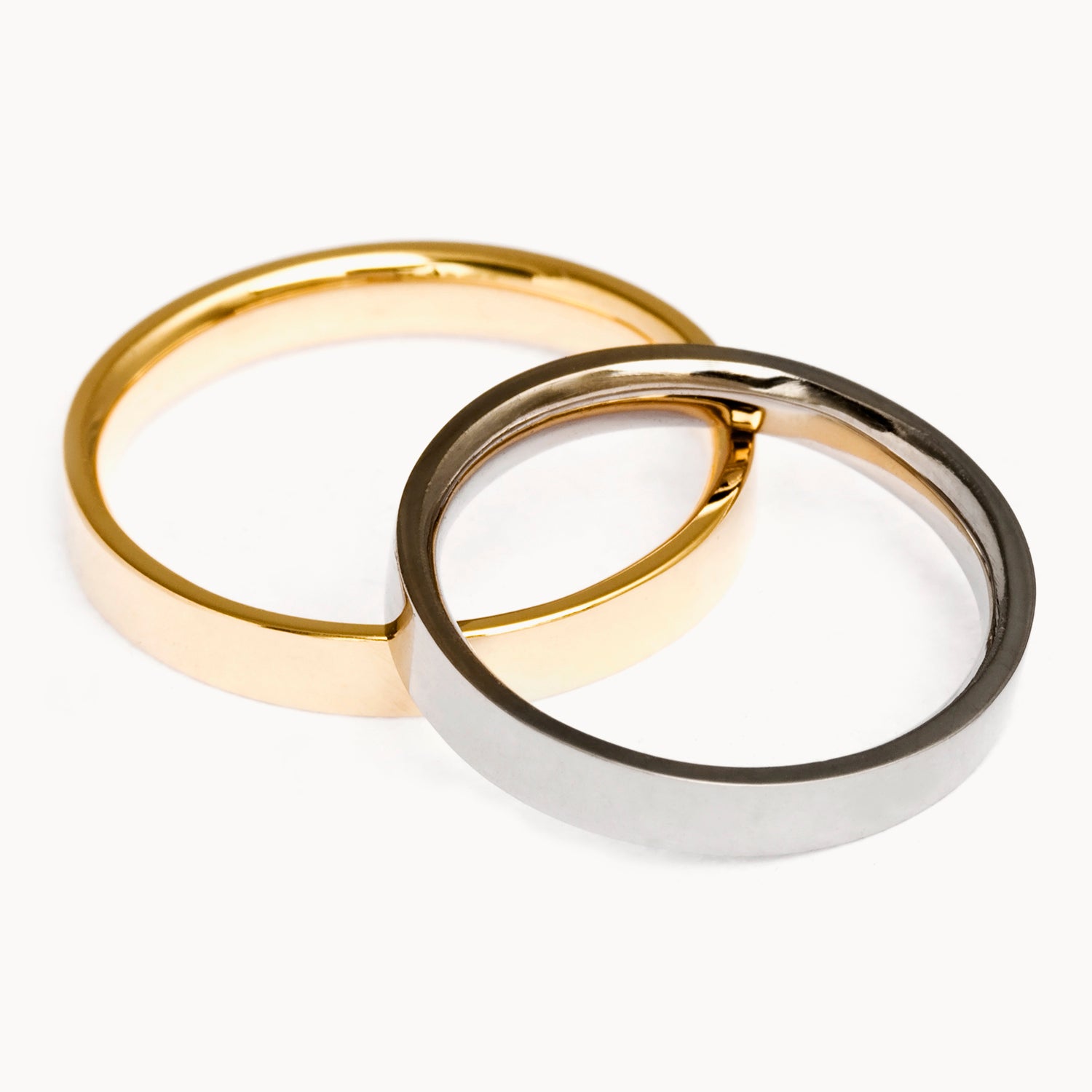 Flat ethical gold wedding bands with polished finishes