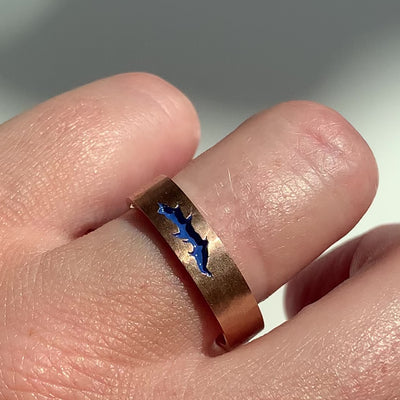 Bespoke flat court wedding band, finished with soft hammered and matte texture and a fissure inlayed with blue enamel. 9ct recycled rose gold reworked from an old heirloom piece, video