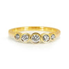 Amy B bespoke engagement ring - 100% recycled yellow gold and 5 conflict-free diamonds in rub-over settings