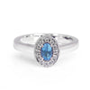 Bespoke Jenna engagement ring - 100% recycled platinum, oval aquamarine and conflict-free diamond halo