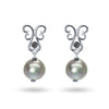 Bespoke drop earrings with black Tahitian pearls, ethical black diamonds and white gold