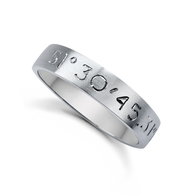 Bespoke wedding rings - hand-engraved coordinates in 100% recycled platinum