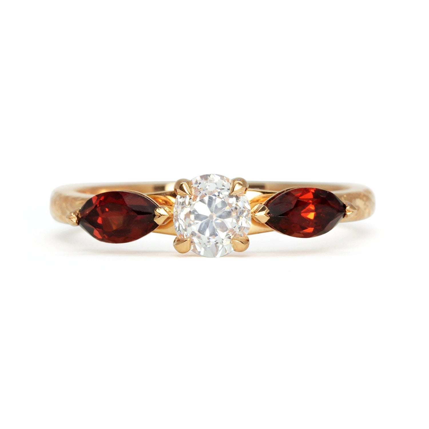 Bespoke Craig ethical trilogy engagement ring, recycled old-cut diamond, fair-traded and conflict-free marquise-cut garnets and 18ct rose Fairmined Ecological Gold