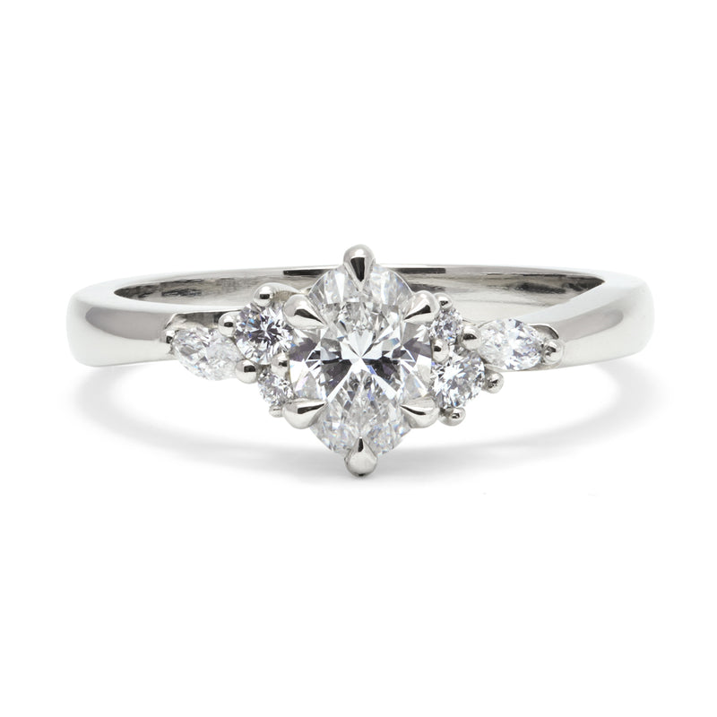 Bespoke Doug cluster engagement ring, traceable and conflict-free diamonds and recycled platinum