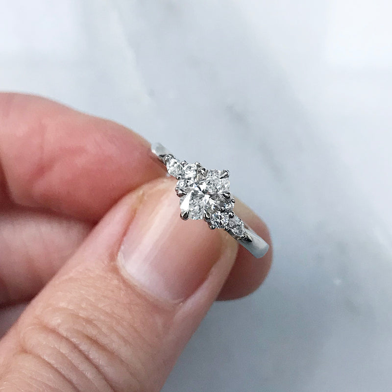 Bespoke Doug cluster engagement ring, traceable and conflict-free diamonds and recycled platinum top