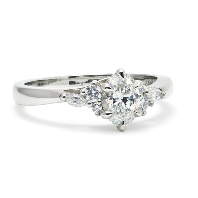 Bespoke Doug cluster engagement ring, traceable and conflict-free diamonds and recycled platinum