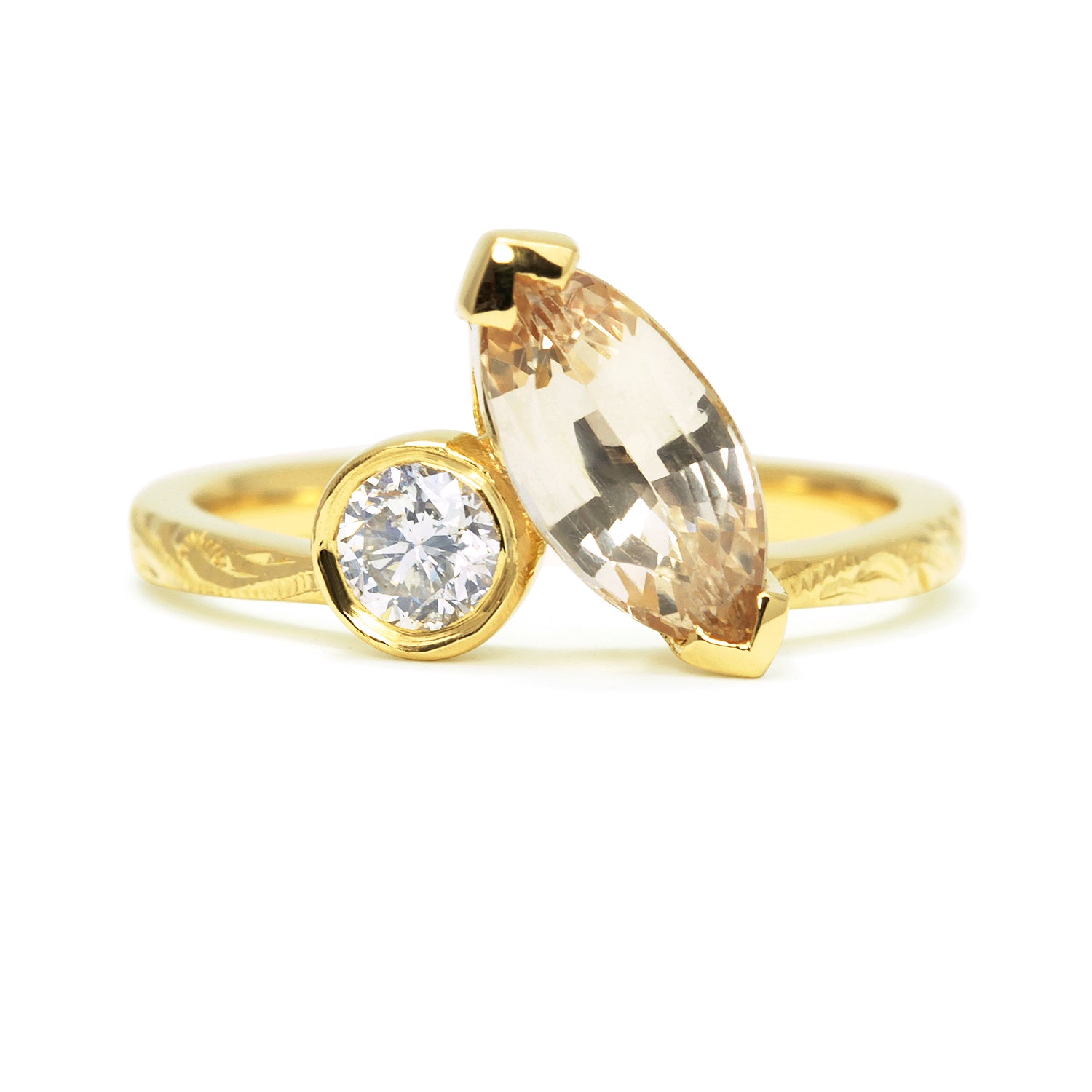 Bespoke Matt toi et moi engagement ring, champagne Sri Lankan marquise sapphire, recycled brilliant-cut diamond and 18ct yellow Fairtrade Gold