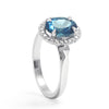 Bespoke Robert Ethical Sapphire Halo Engagement Ring, 100% recycled platinum, conflict-free Canadian diamonds and an oval-cut fair-traded Malawi sapphire 2