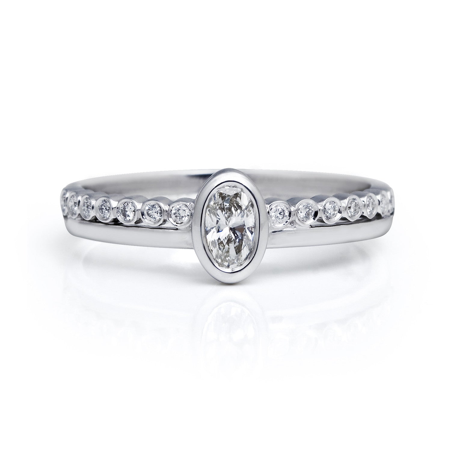 Bespoke engagement ring - oval Canadian diamond and 18ct recycled white gold