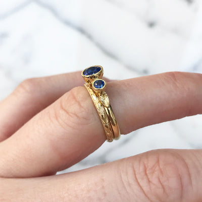 Bespoke ethical sapphire trilogy engagement ring, 18ct recycled yellow gold and traceable Sri Lankan sapphires lifestyle
