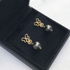 Bespoke drop earrings with black Tahitian pearls