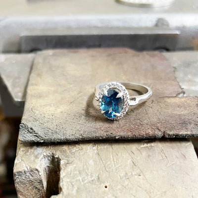Bespoke Robert Ethical Sapphire Halo Engagement Ring, 100% recycled platinum, conflict-free Canadian diamonds and an oval-cut fair-traded Malawi sapphire 4