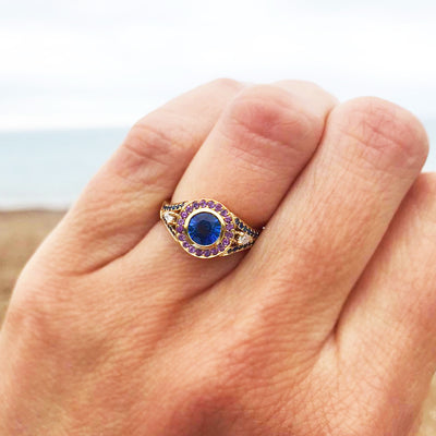 Bespoke Laura engagement ring with a 0.9ct blue Sri Lankan sapphire, blue Australian sapphires, pear-cut conflict-free African diamonds, fair-traded amethyst and 18ct yellow Fairtrade Gold 4